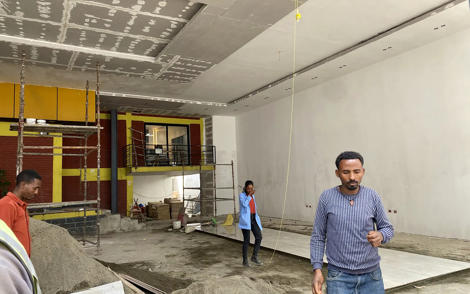 Interior wall, ceiling and floor finishing works in progress