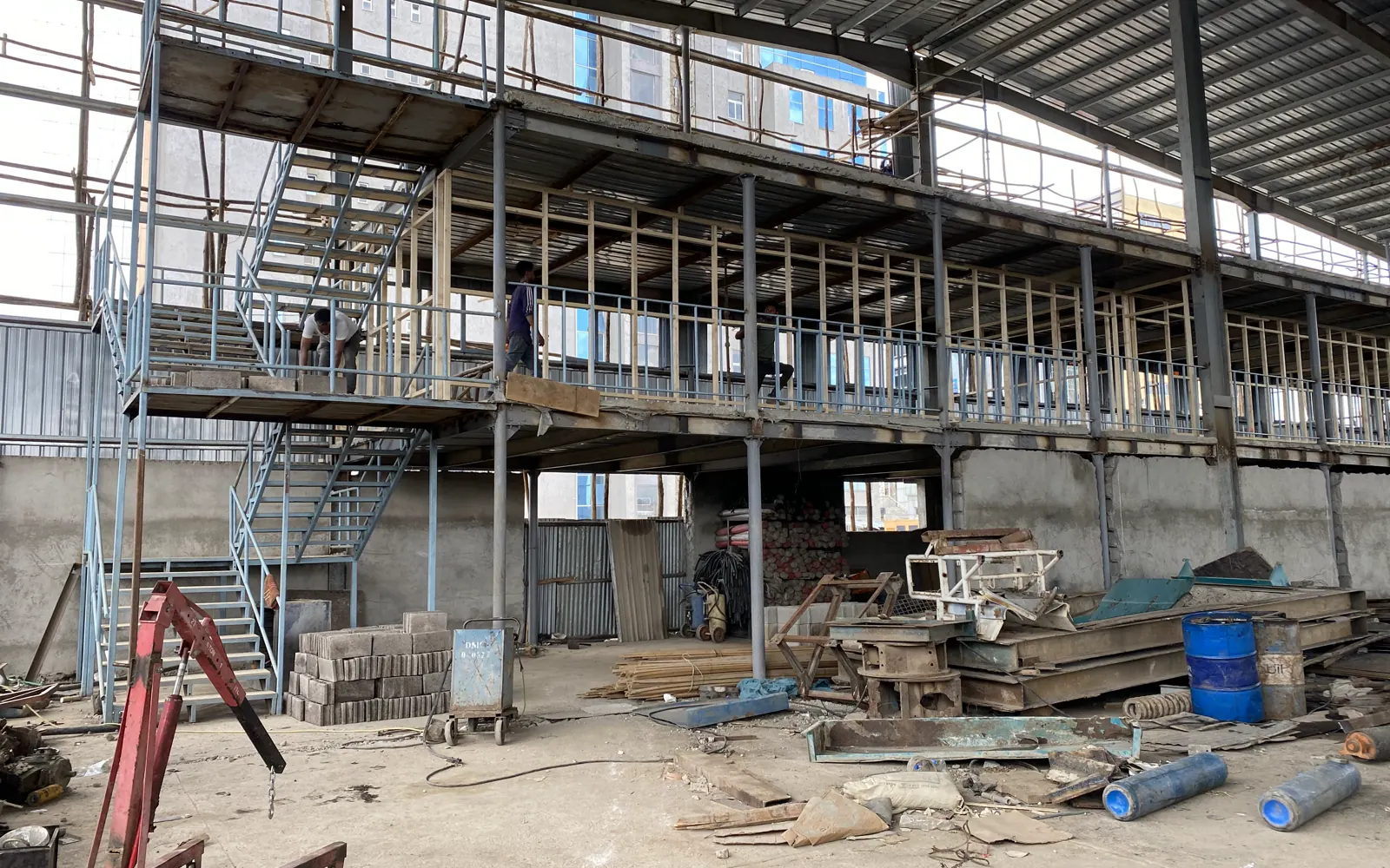 Multi-level steel frame and stairs under construction